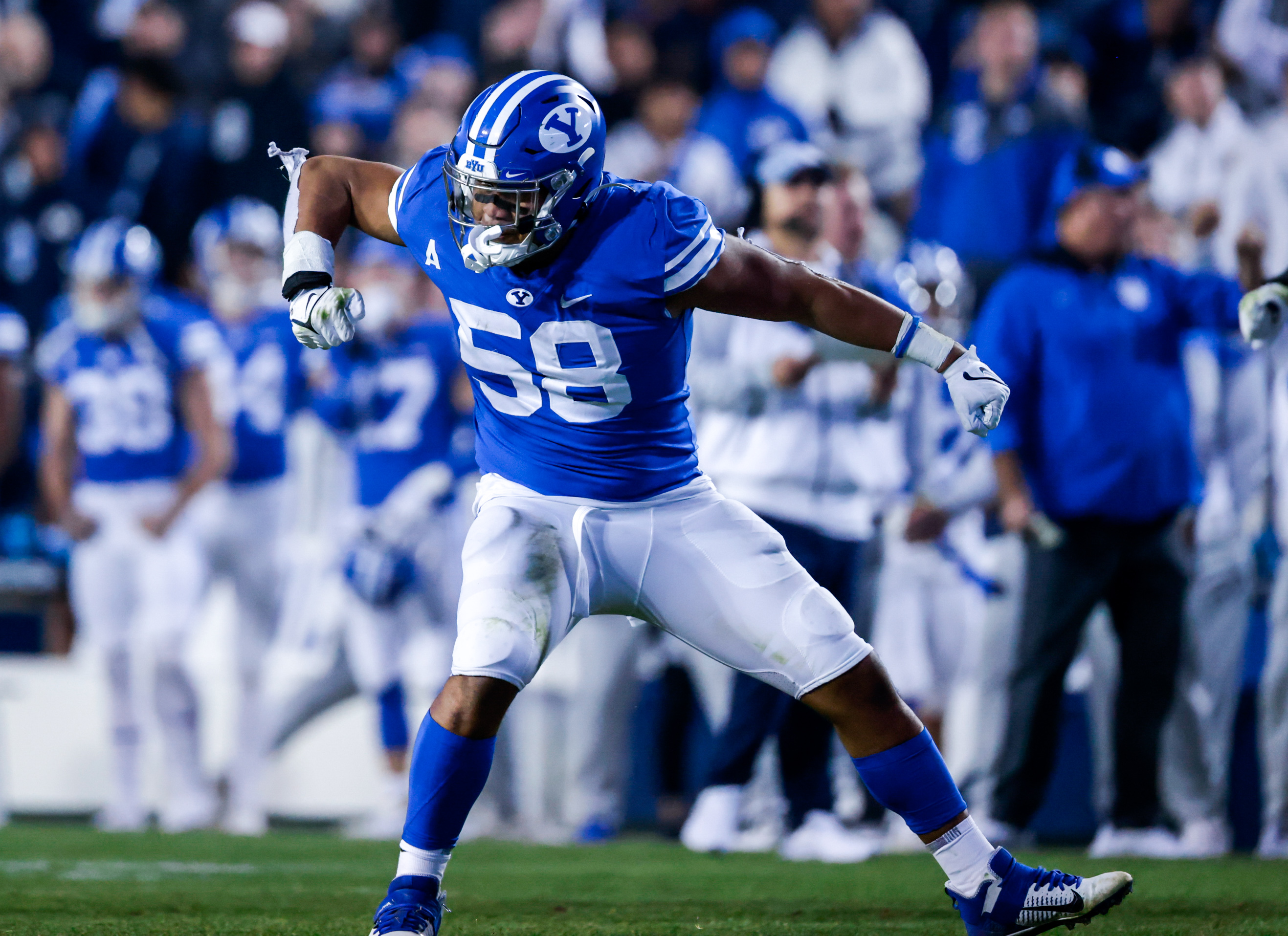 Uriah Leiataua celebrates his fumble recovery in BYU's 66-49 win over the Virginia Cavaliers.