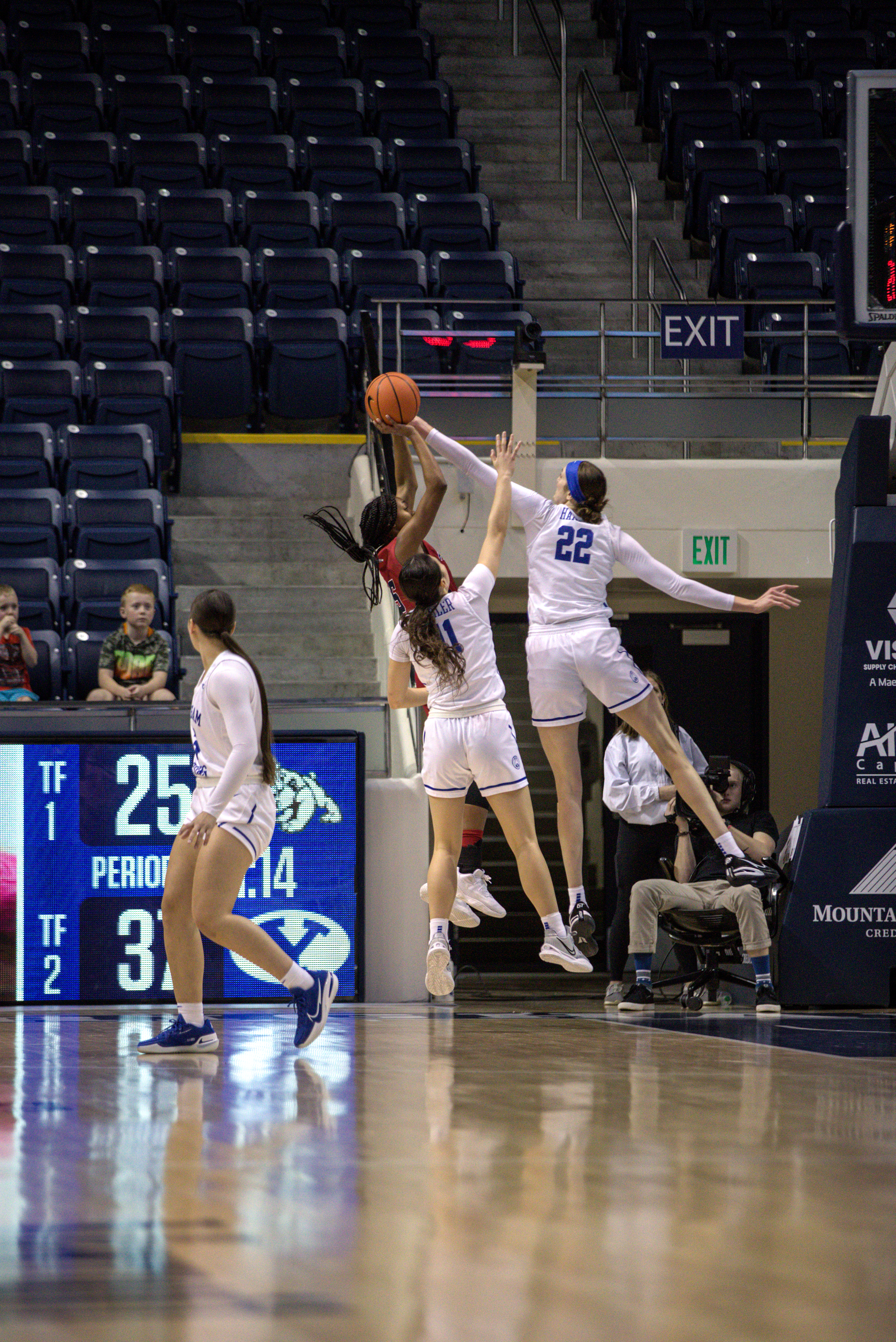 Sara Hamson blocks a shot in an 80-64 BYU win over the Fresno State Bulldogs in the Marriott Center.