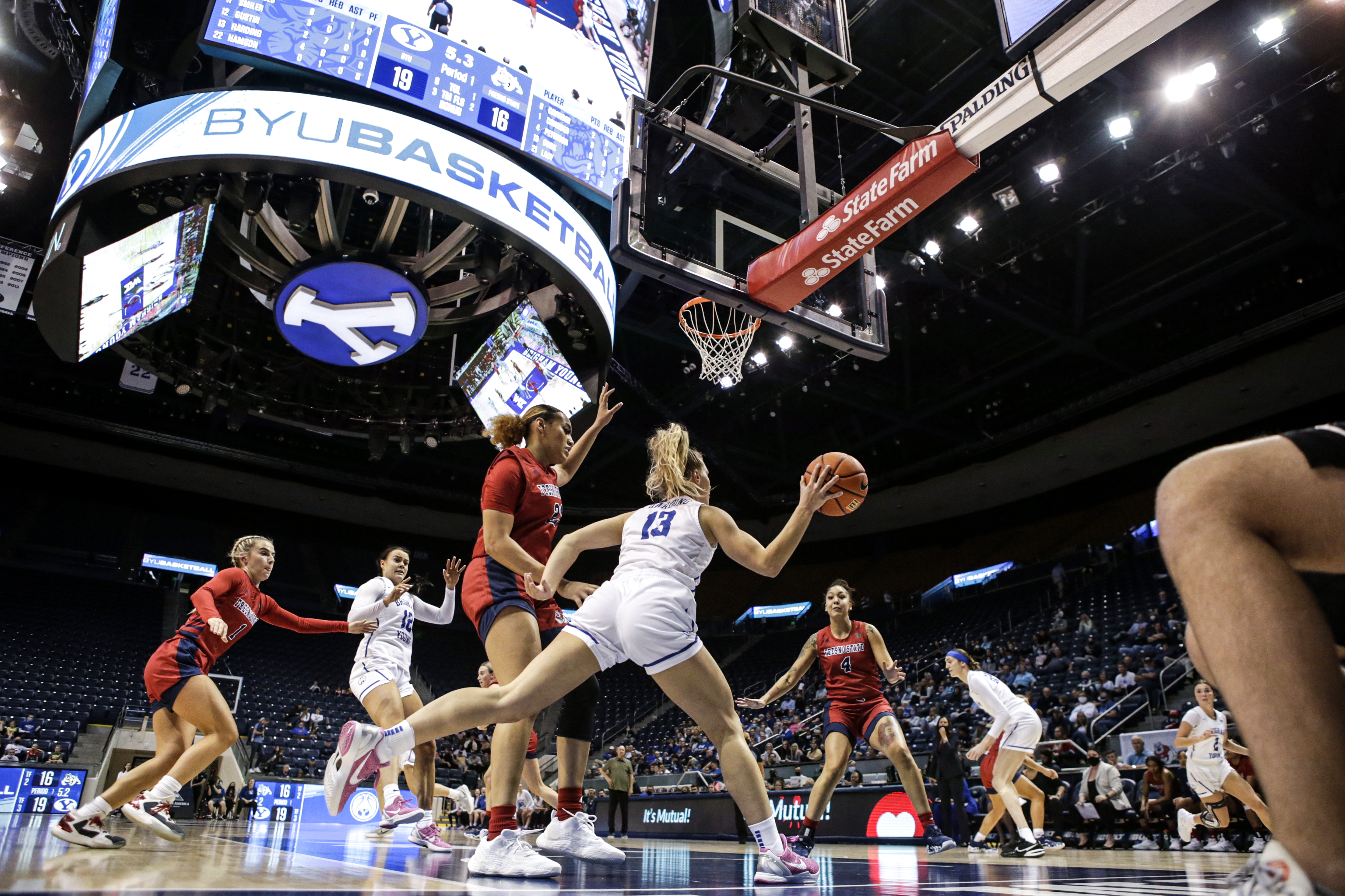 Paisley Hardin finds Shaylee Gonzales for a three point shot in an 80-64 BYU win over the Fresno State Bulldogs in the Marriott Center.