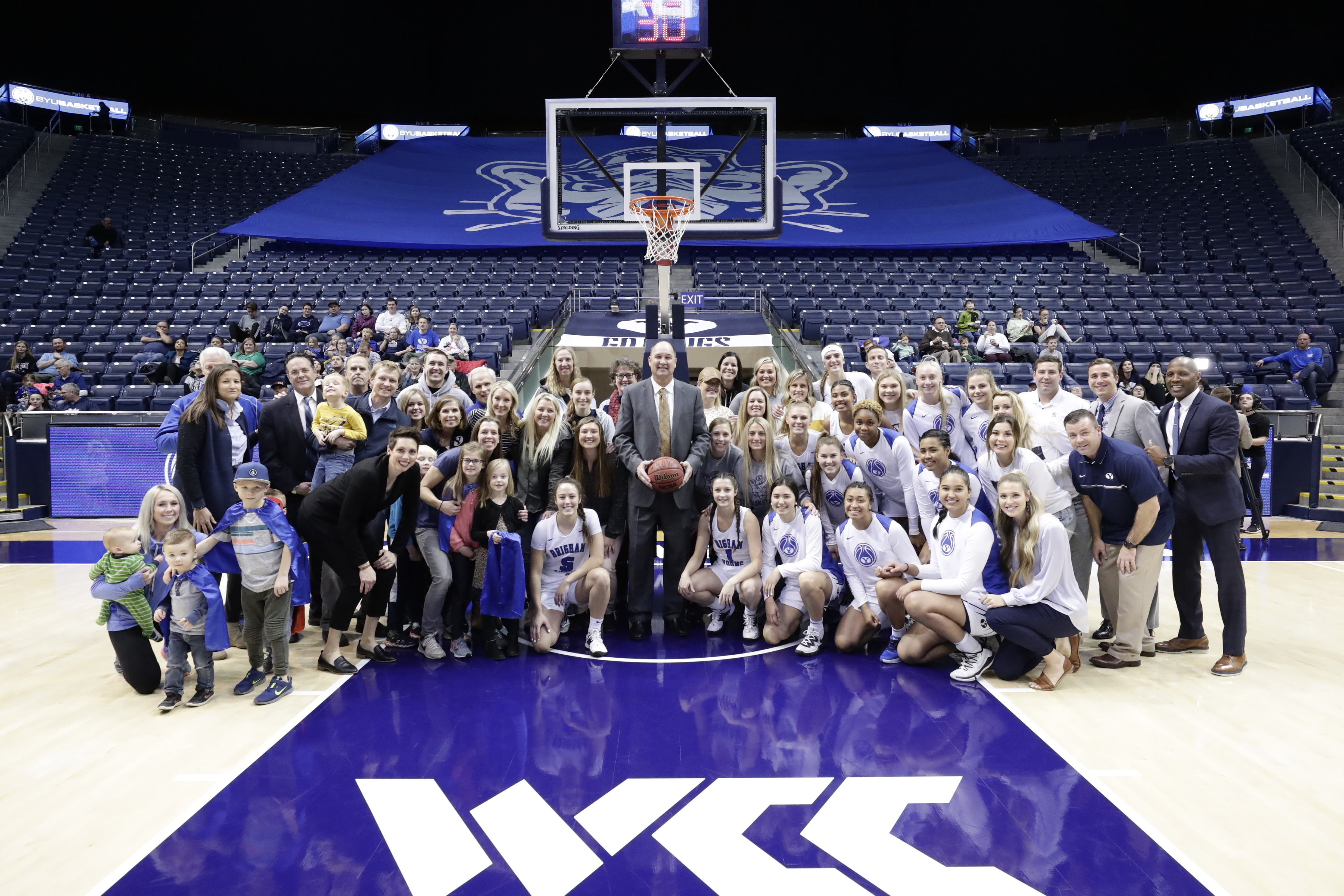 Prior to the start of the game, BYU head coach Jeff Judkins was recognized for getting his 400th win on Monday, Dec. 30 with a 65-47 road win at Pepperdine. He was joined by his family, current and former players and former coaches on the court. 