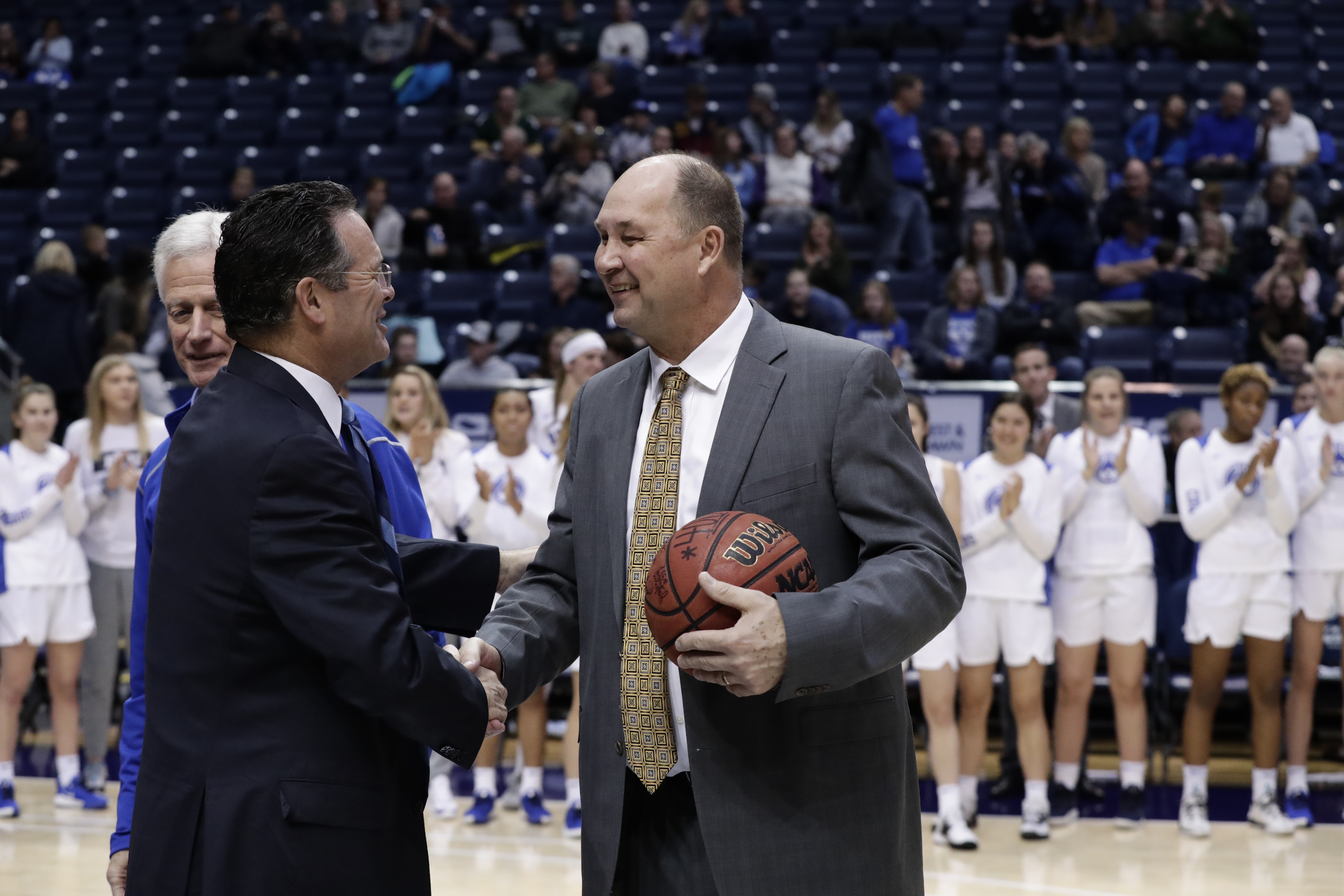 Prior to the start of the game, BYU head coach Jeff Judkins was recognized for getting his 400th win on Monday, Dec. 30 with a 65-47 road win at Pepperdine. He was joined by his family, current and former players and former coaches on the court. 