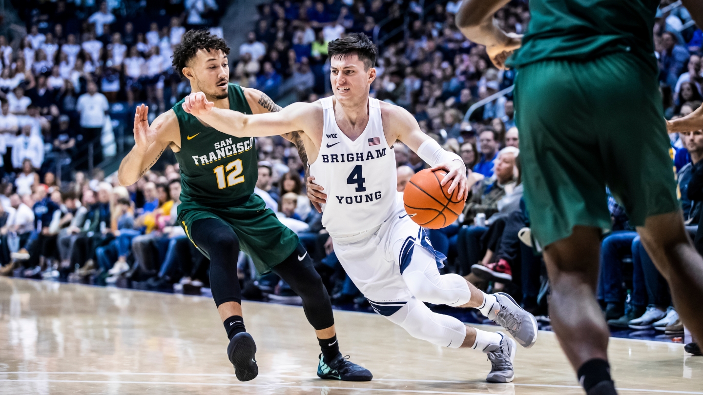 Alex Barcello drives with the ball against San Francisco