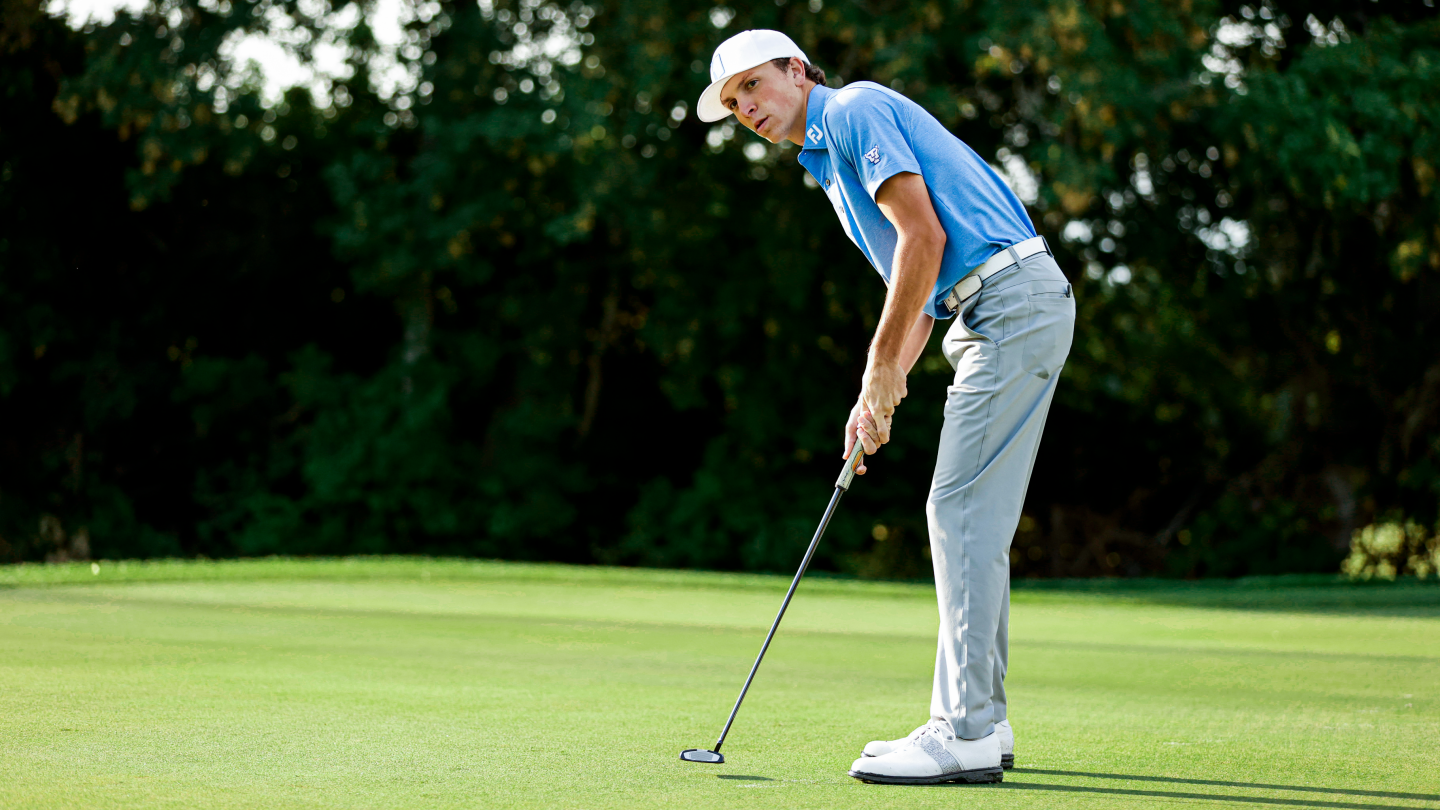 BYU men's golfer Cole Ponich hits a putt at Riverside Country Club.