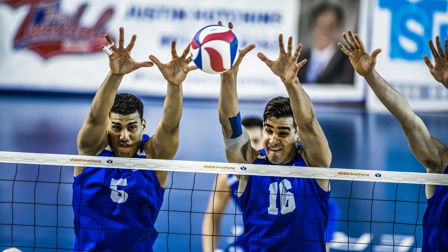 Gabi Garcia Fernandez and Felipe de Brito Ferreira go up for a block against in a match featuring BYU men's volleyball and Penn State