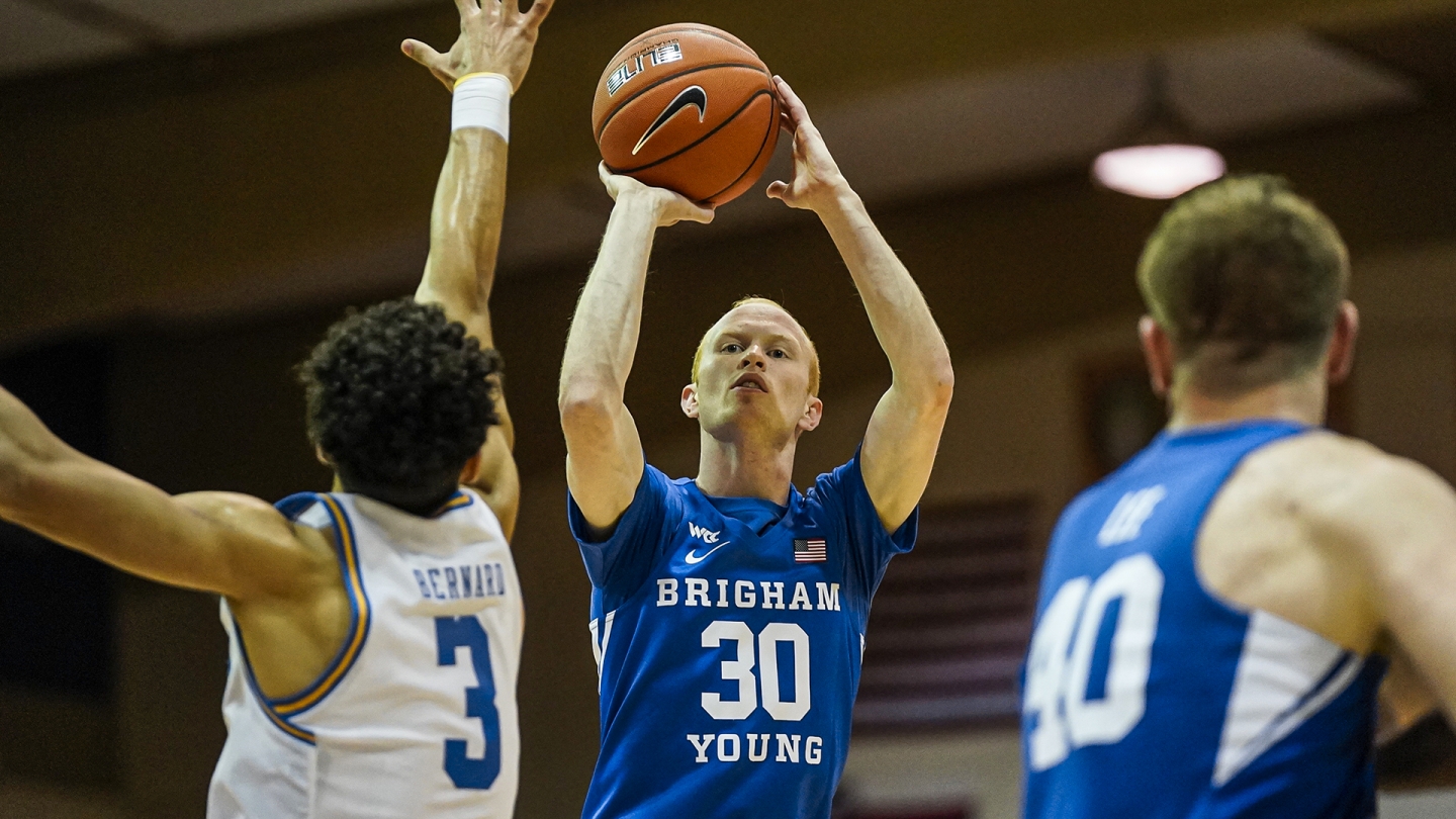 TJ Haws shoots a contested jump shot against UCLA in Maui.