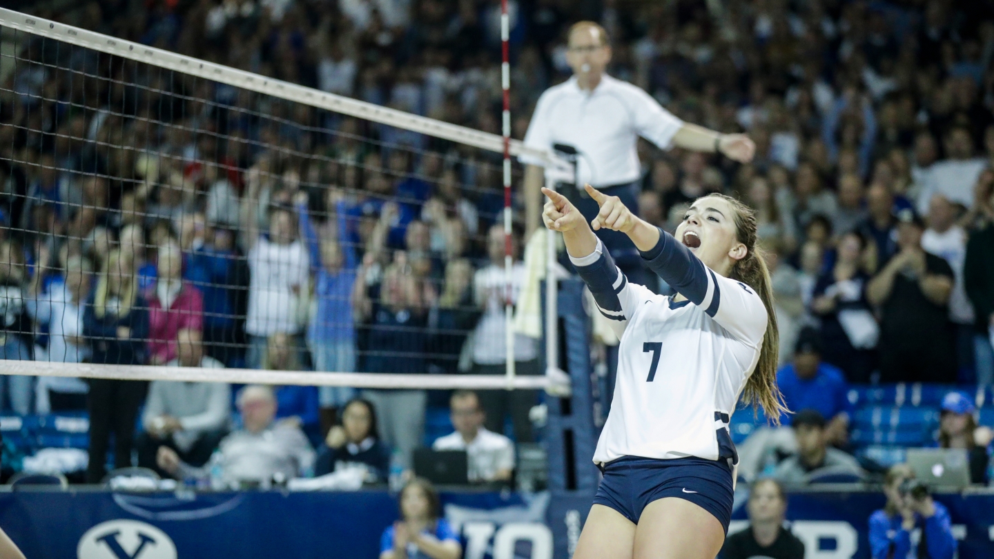 Whitney Bower celebrates winning a point.