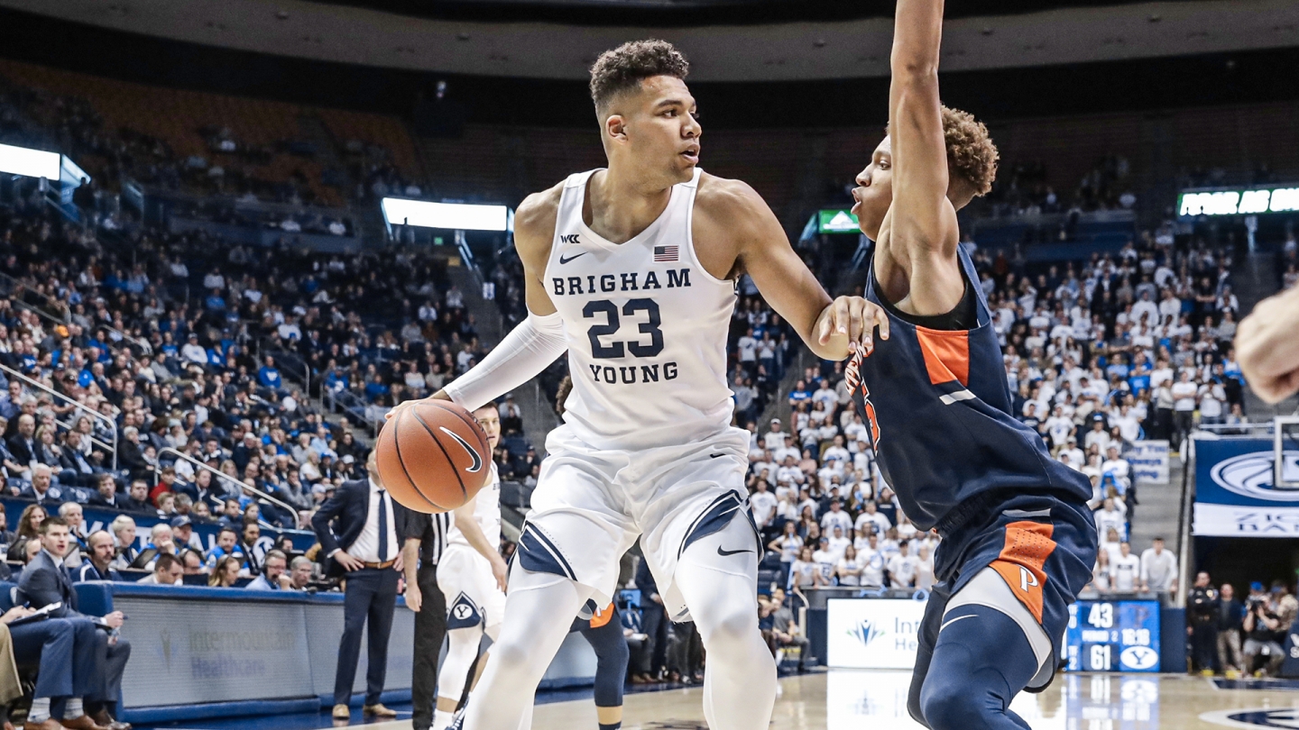 Yoeli Chids works in the post against a Pepperdine defender.